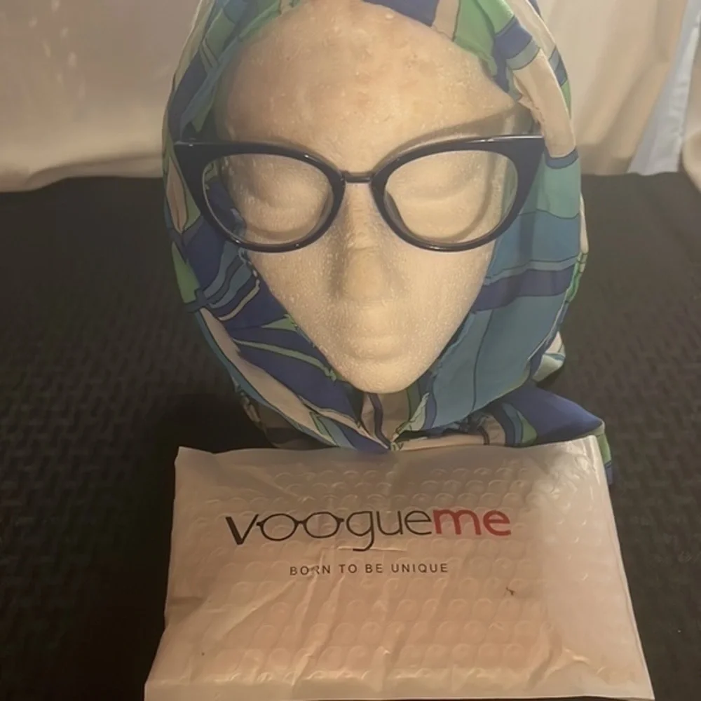 Royal blue plastic frame with metal arms. From Vooogue Me.